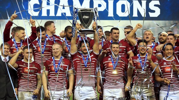World Club champions Wigan celebrate their famous victory over the Sharks in February.