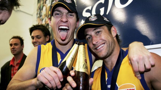 From massive highs to crashing lows: Chad Fletcher (right) with Sam Butler after the 2006 grand final.