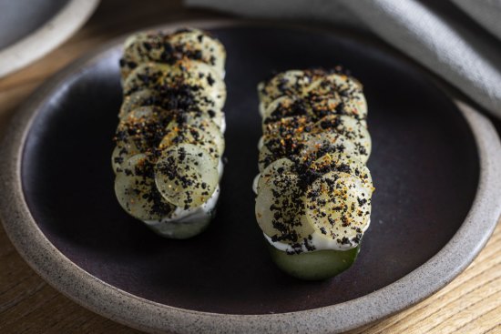 Go-to dish: Charred cucumber with smoked yoghurt, muscat grapes and shichimi.