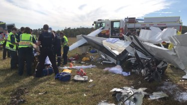 Emergency service crews at the aftermath of the Caloundra plane crash.