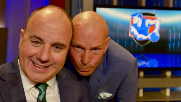 A newly bald Sam Newman, right, with Craig Hutchison on The Footy Show.