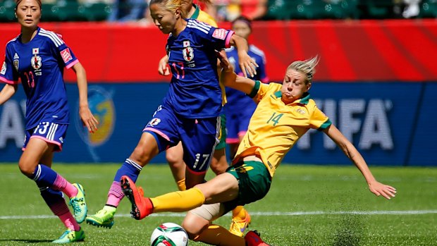 Desperate defence:  Alanna Kennedy of Australia.