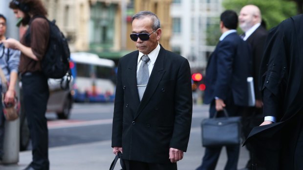 Quy Huy Hoang leaves Downing Centre Local Court on October 20, 2015.