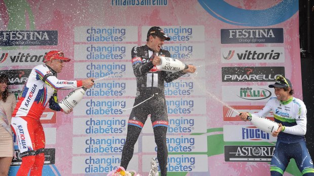 John Degenkolb, centre, celebrates his Milan-San Remo win with second-placed Alexander Kristoff and third-placed Australian Michael Matthews.