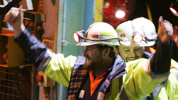 Miners Todd Russell, left, and Brant Webb, smile as they emerge from Beaconsfield mine.