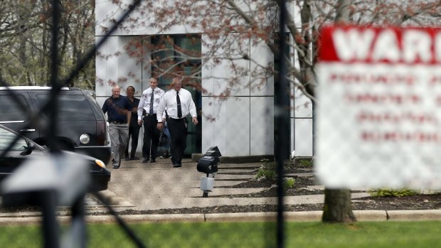 Police officers at Prince's Paisley Park complex after the musician's death.