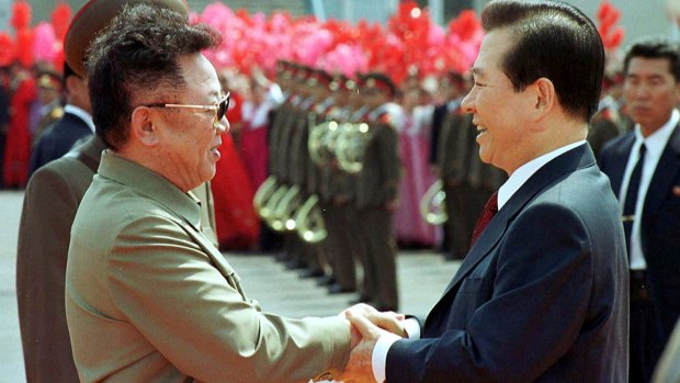 Then North Korean leader Kim Jong-il, left, and then South Korean President Kim Dae-jung shake hands in Pyongyang in 2000. 