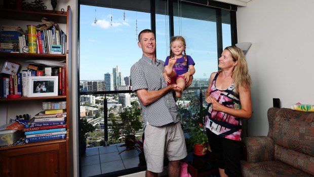 Marton Sadler with wife Agata and child Olivia. He travels 25 minutes to play in a grassy area with Olivia from their Southbank  apartment.