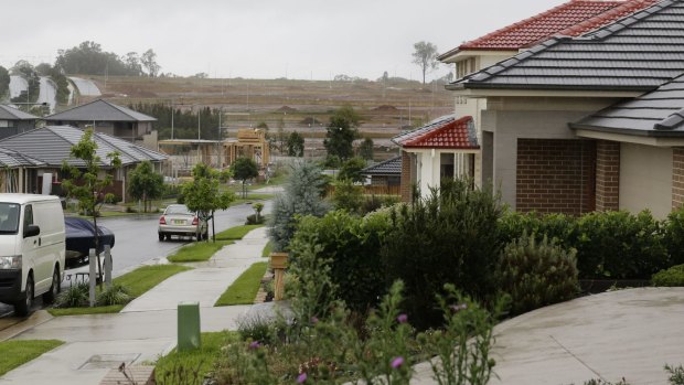 Newly built houses alongside empty land at Oran Park in Sydney's southwest.