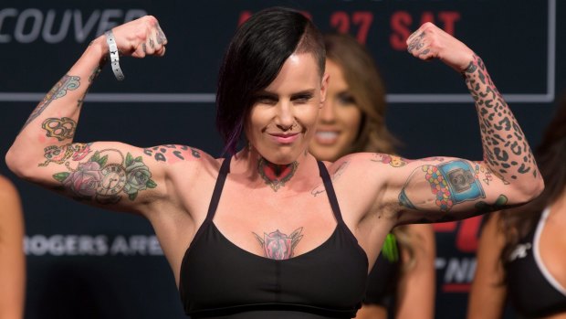 Bec Rawlings, of Australia, poses during the weigh-in for a UFC Fight Night event in Vancouver.