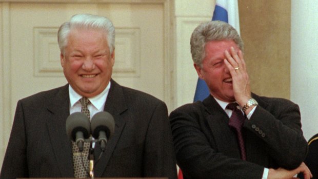 Russian President Boris Yeltsin forces US President Bill Clinton into a fit of laughter.