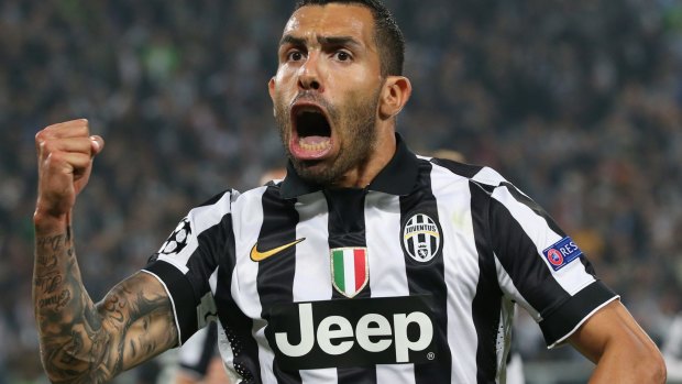In the moment: Carlos Tevez celebrates his match-winning strike.
