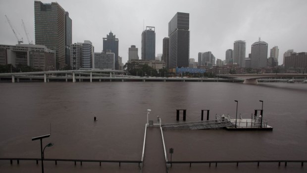 The Brisbane River inundates the South Bank CityCat terminal, near the Cafe San Marco site, during the 2011 floods. 
