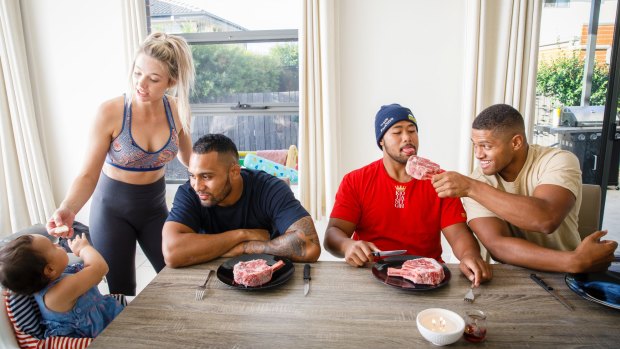 Brumbies household. L-R: one-year-old Miah, Jess Carroll, Lolo Fakaosilea, Folau Fainga'a, and Rob Valetini.