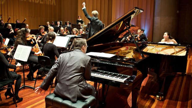 Pianists Dr Edward Neeman and Dr Stefanie Neeman and the Canberra Youth Orchestra conducted by Leonard Weiss.