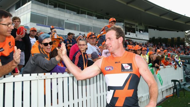 CANBERRA, AUSTRALIA - APRIL 17: Steve Johnson of the Giants thanks fans after winning the round four AFL match between the Greater Western Sydney Giants and the Port Adelaide Power at Star Track Oval on April 17, 2016 in Canberra, Australia.  (Photo by Cameron Spencer/Getty Images)