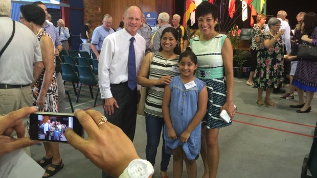 Campbell and Lisa Newman with the Lohani family at The Gap State School.