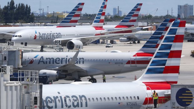 A woman who uses a wheelchair and is legally blind was told to "hold it" by crew on American Airlines.