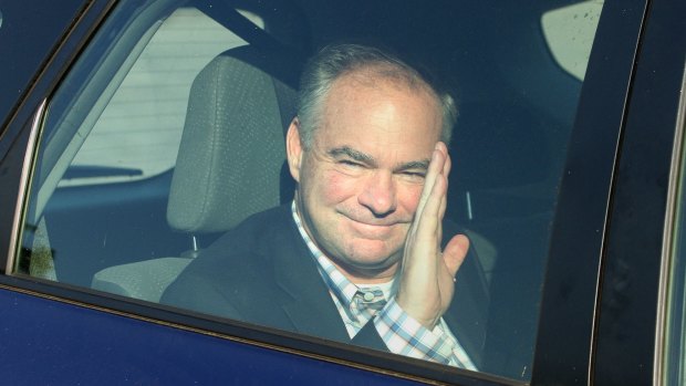 Virginia Senator Tim Kaine waves to the crowd before attending a private fundraiser event in Newport, Rhode Island, hosted by fellow Democratic Senator Jack Reed.