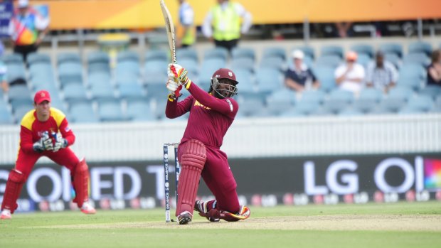 The West Indies' Chris Gayle on his way to setting his record score, but few were in the stands to see him do it.