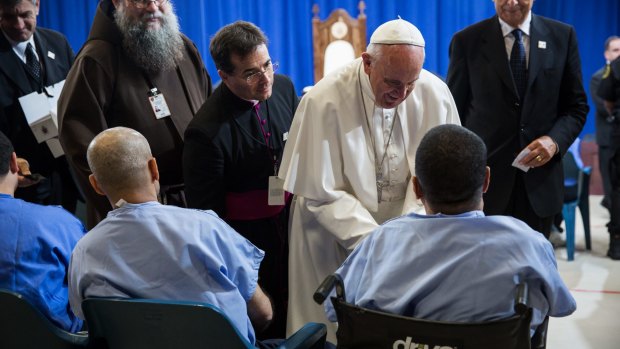Pope Francis greets inmates during his visit to Curran-Fromhold Correctional Facility in Philadelphia last month.