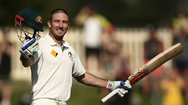 Ton up: Shaun Marsh celebrates after reaching his century against the West Indies 