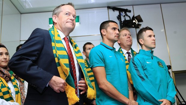 Socceroos Tim Cahill and Matt McKay with Bill Shorten during a visit to Parliament House on Monday.