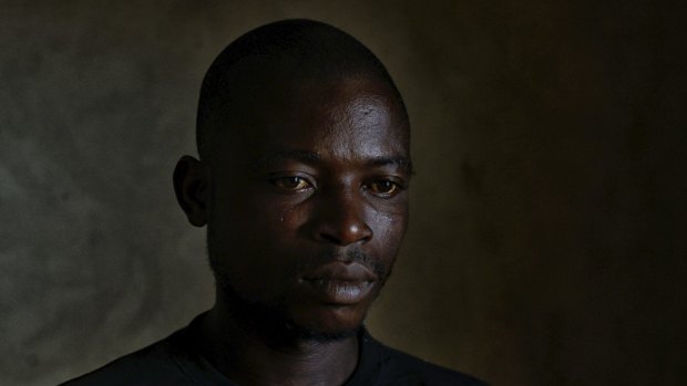 William Togpah, who helped burn bodies during the Ebola outbreak, in Marshall, Liberia.