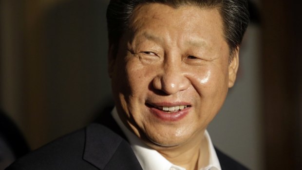 Chinese President Xi Jinping smiles as he concludes a visit to Lincoln High School, in Tacoma, Washington, during a trip to the US in September.