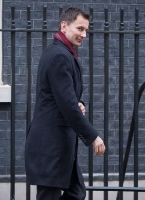 British Health Secretary Jeremy Hunt leaves No. 10 Downing Steet in London following a meeting to discuss Ebola after confirmation of the first  Ebola patient to be diagnosed in the UK.