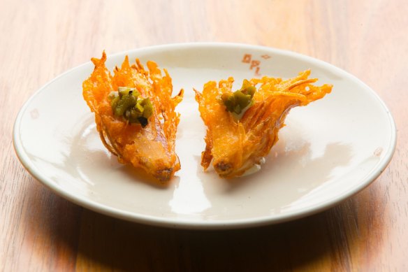 Like a bloomin' onion in miniature: fried shallot with jalapeno cashew sour cream