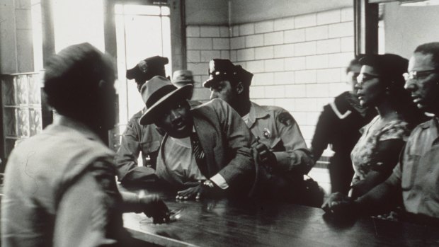 Civil rights leader Martin Luther King Jnr is arrested in Montgomery, Alabama in 1958. 