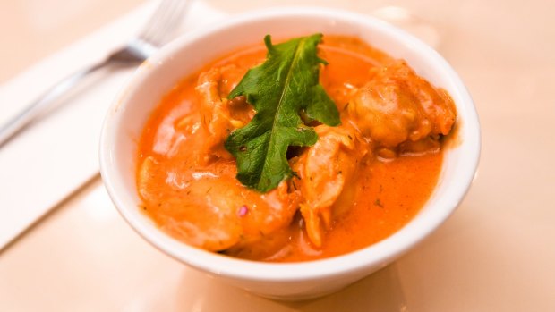 Chicken khandahari, a turmeric-stained yoghurt curry.