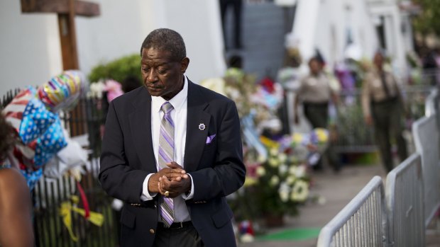 Church member Thomas Rose leaves a wake for Clementa Pinckney, one of the nine killed in last week's shooting at Emanuel AME Church.