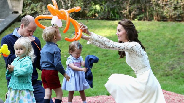 The Duchess of Cambridge entertains Prince George with a spider balloon at a children's party for Military families during the Royal Tour of Canada on September 29, 2016 in Victoria, Canada.
