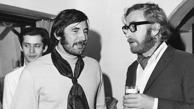 Lazenby (left) with Michael Caine at the height of his fame. He refused to shave his beard for the Bond press tour.