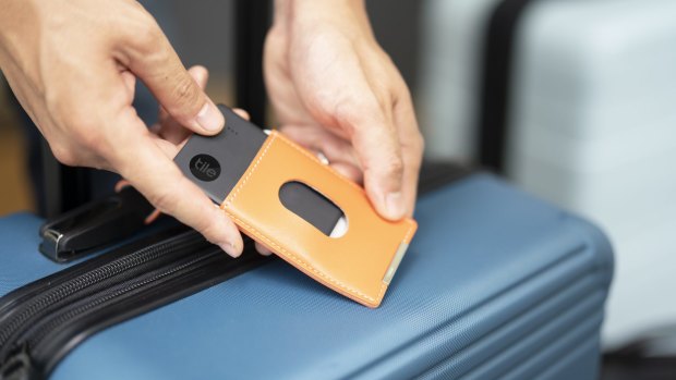 A Tile Slim luggage tag tracker. Lufthansa has caused confusion after tweeting such devices are banned from checked baggage on flights.
