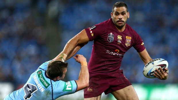 Quiet game: Josh Morris tackles Greg Inglis during the Blues' loss in Origin I last month.