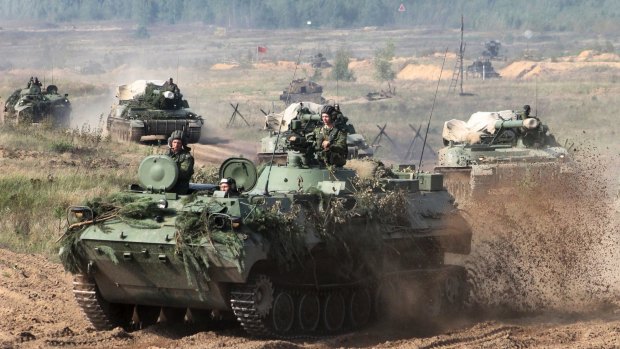 Belarusian army vehicles prepare for war games with Russia at an undisclosed location in Belarus. 