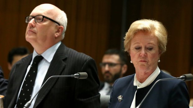 Unworkable: Attorney-General George Brandis and Professor Gillian Triggs appear before a parliamentary committee.