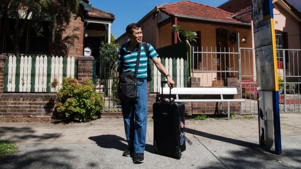 Canadian David waiting for the bus to Sydney Airport at Banksia train station.