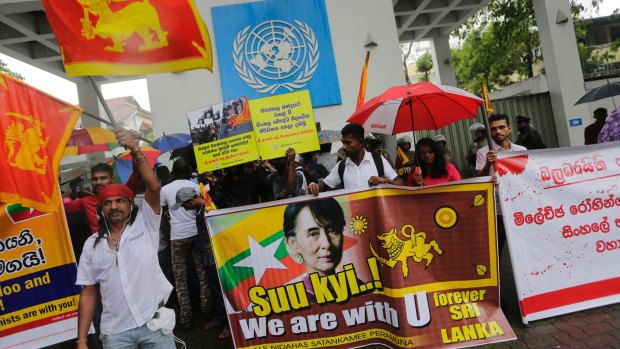 Sri Lankan Buddhists express solidarity with Myanmar Buddhists, outside the UN office in Colombo on Wednesday. Sign in centre reads "We do not want any Rohingya extremists who killed Buddhist monks". 