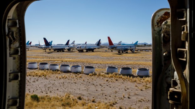 Planes in storage and detached engine cowlings at Pinal Airpark, which is sometimes called a graveyard or boneyard for planes.