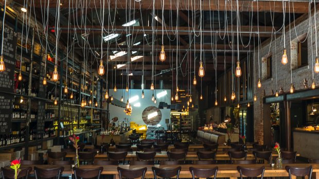 Dangling light bulbs are a feature at Bread in Common, Fremantle.