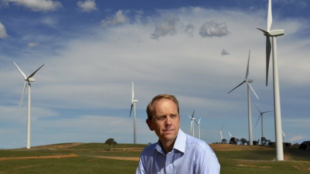 Simon Corbell, pictured at the Acciona Energy wind farm at Gunning, has championed renewable energy during his time in the ACT government. 