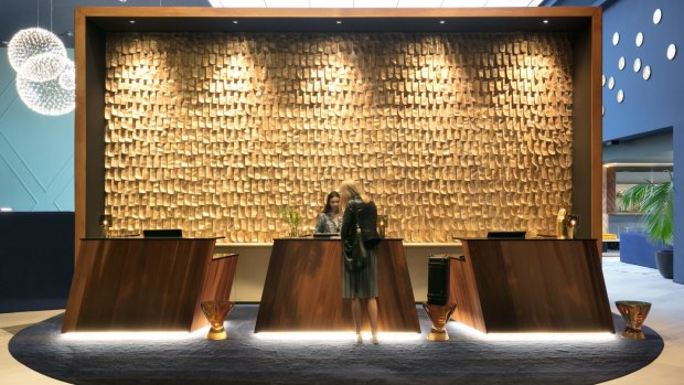The design of Naumi Auckland Airport Hotel draws inspiration from the flight of a native New Zealand bird.