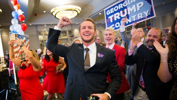 Supporters of Donald Trump at a Republican watch party at the Grand Hyatt Atlanta.