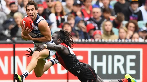 Making a Menz: Daniel Menzel marks in front of Anthony McDonald-Tipungwuti.