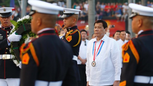 Philippine President Rodrigo Duterte, second right, has a history of hyperbole.