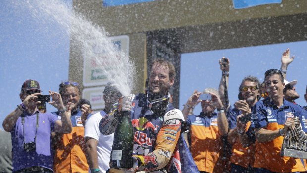 Champagne moment: Toby Price celebrates.